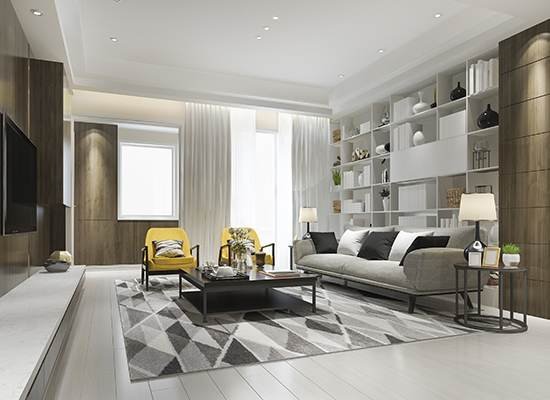 living room with white furniture and yellow accents